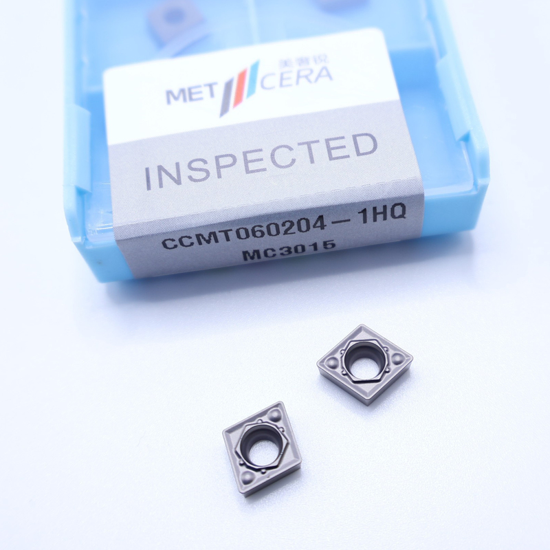 Pezzo di lavoro in acciaio al carbonio CCMT060204-1HQ MC3015 Inserti di utensili di taglio cermetti con resistenza alle fratture e superficie liscia
